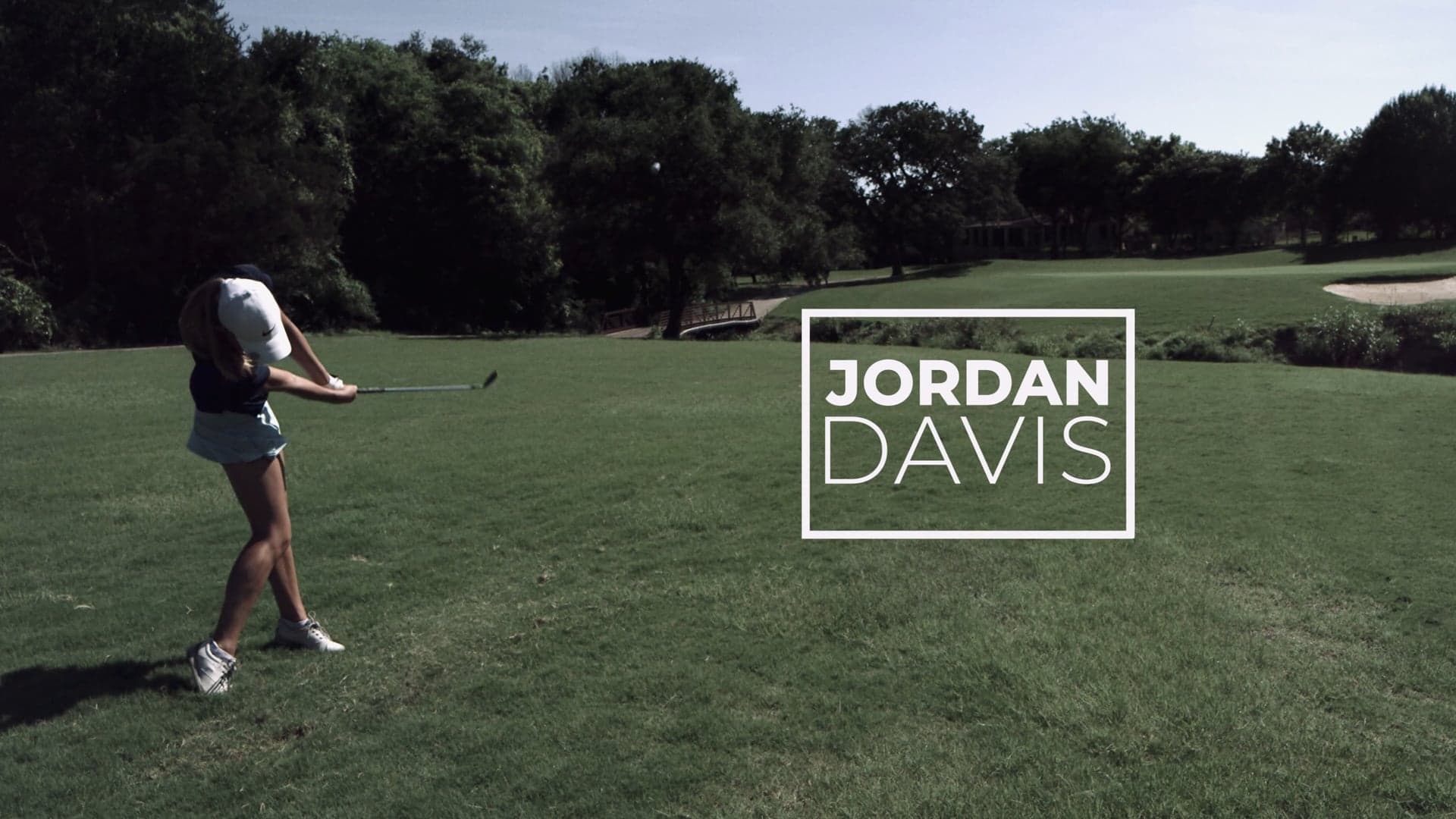 Jordan Davis mid-swing on the fairway at Forest Creek in Round Rock, from the 2021 golf recruitment film