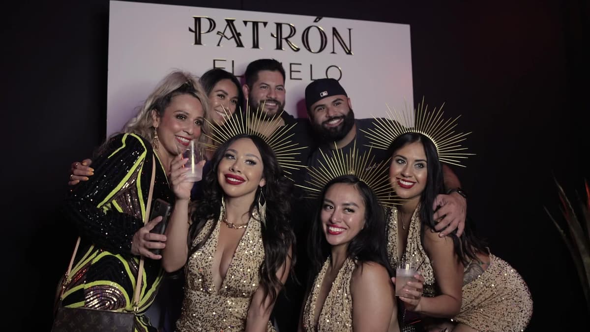 Patron El Cielo Austin film still. Guests in gold on the El Cielo step and repeat.