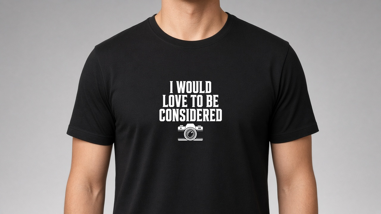 Black I Would Love To Be Considered tee, white print on the chest.